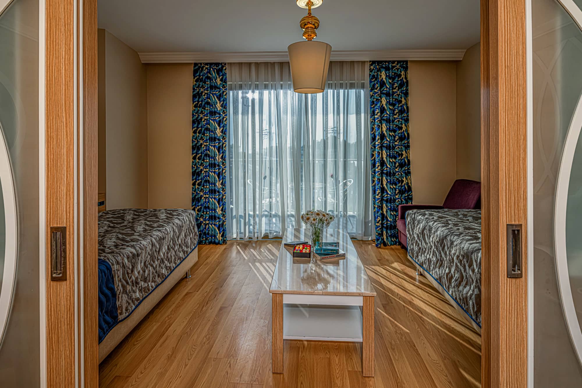 rooms-main-building-family-2-bedrooms-with-sliding-doors-land-view-couple--ladies-only