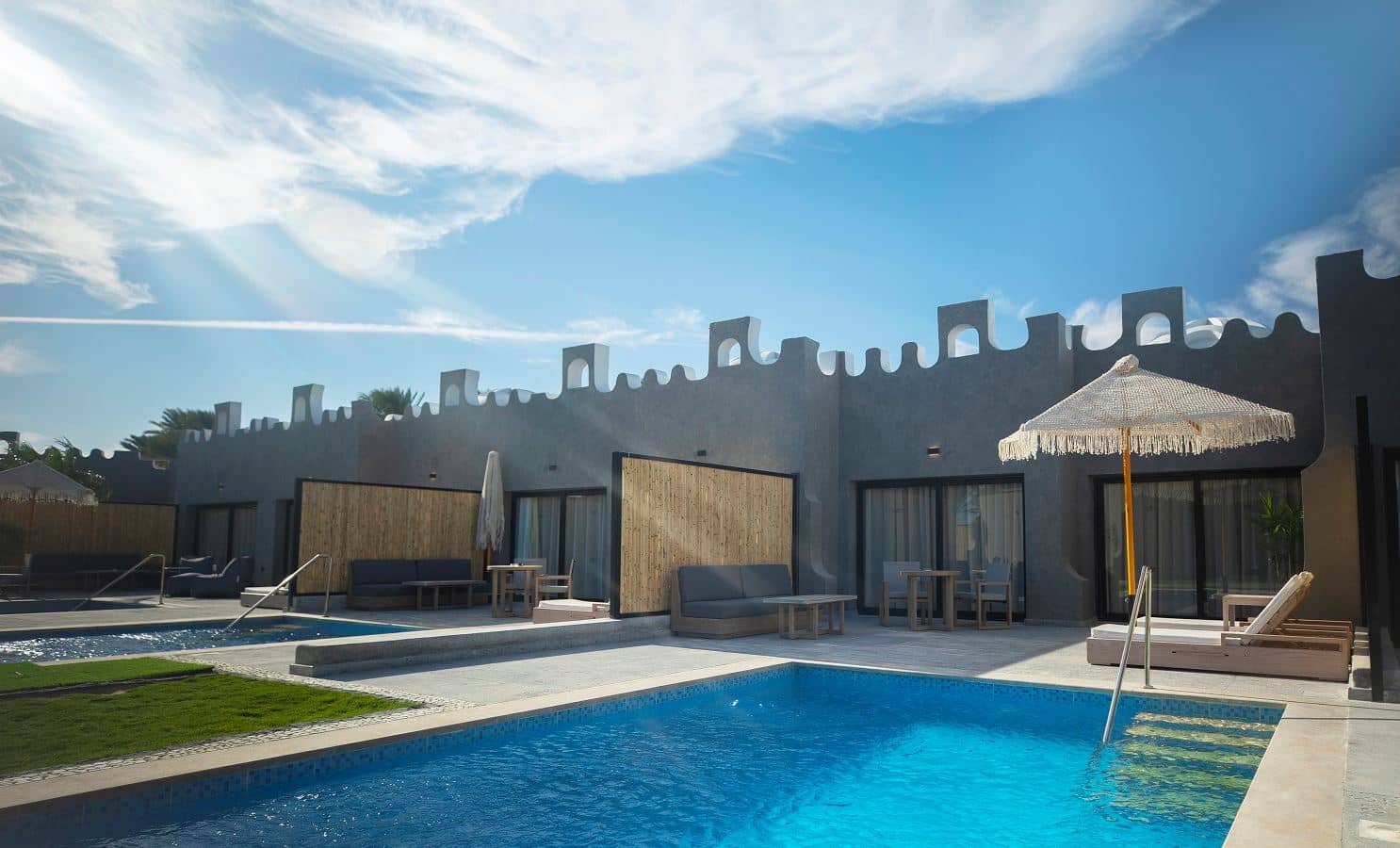 rooms-tucana-pool-suite-partial-sea-view
