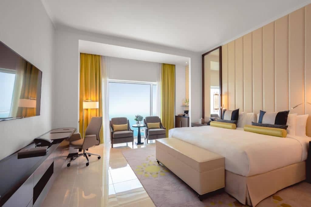 rooms-two-bedroom-family-room-courtyard--corniche-view
