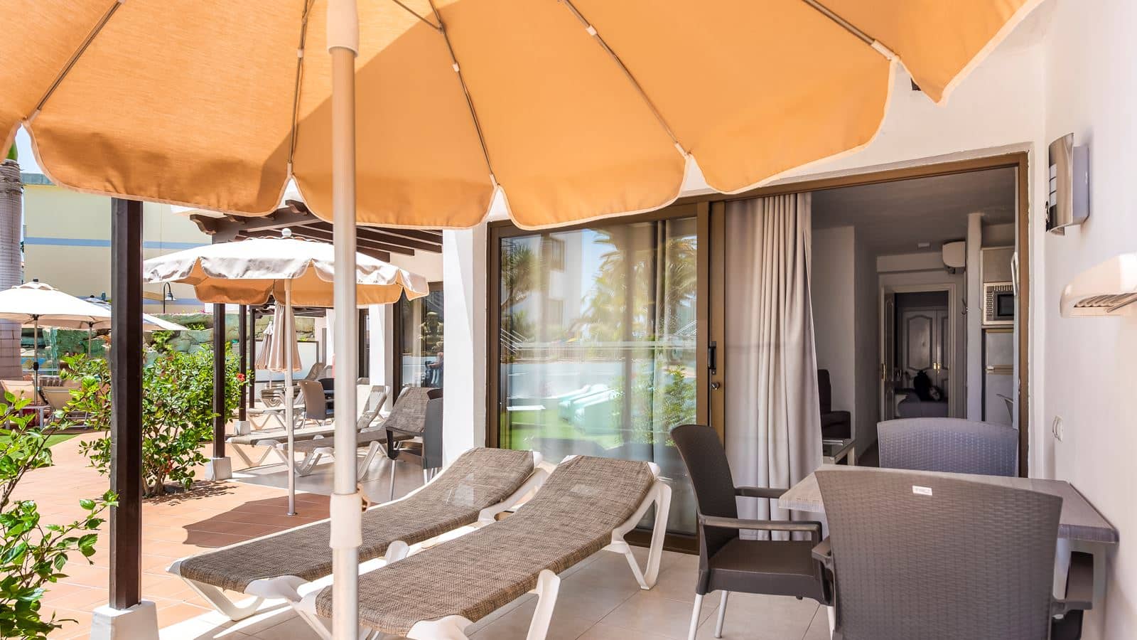 rooms-1-bedroom-apartment-pool-or-garden-view-with-balcony