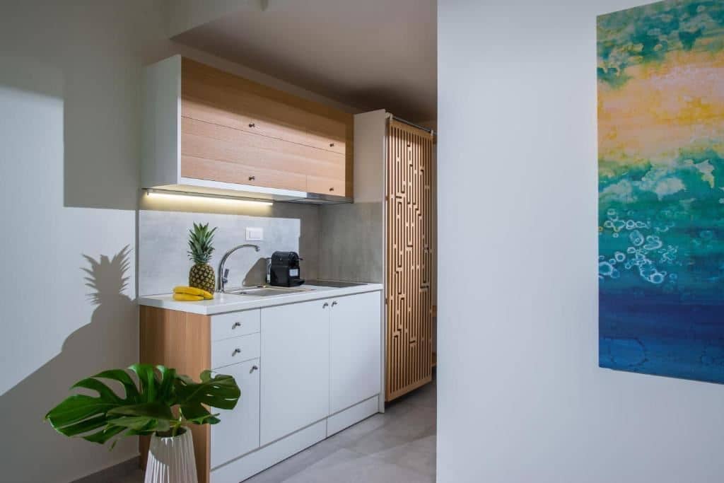 rooms-studio-deluxe-poolview-balcony-or-terrace