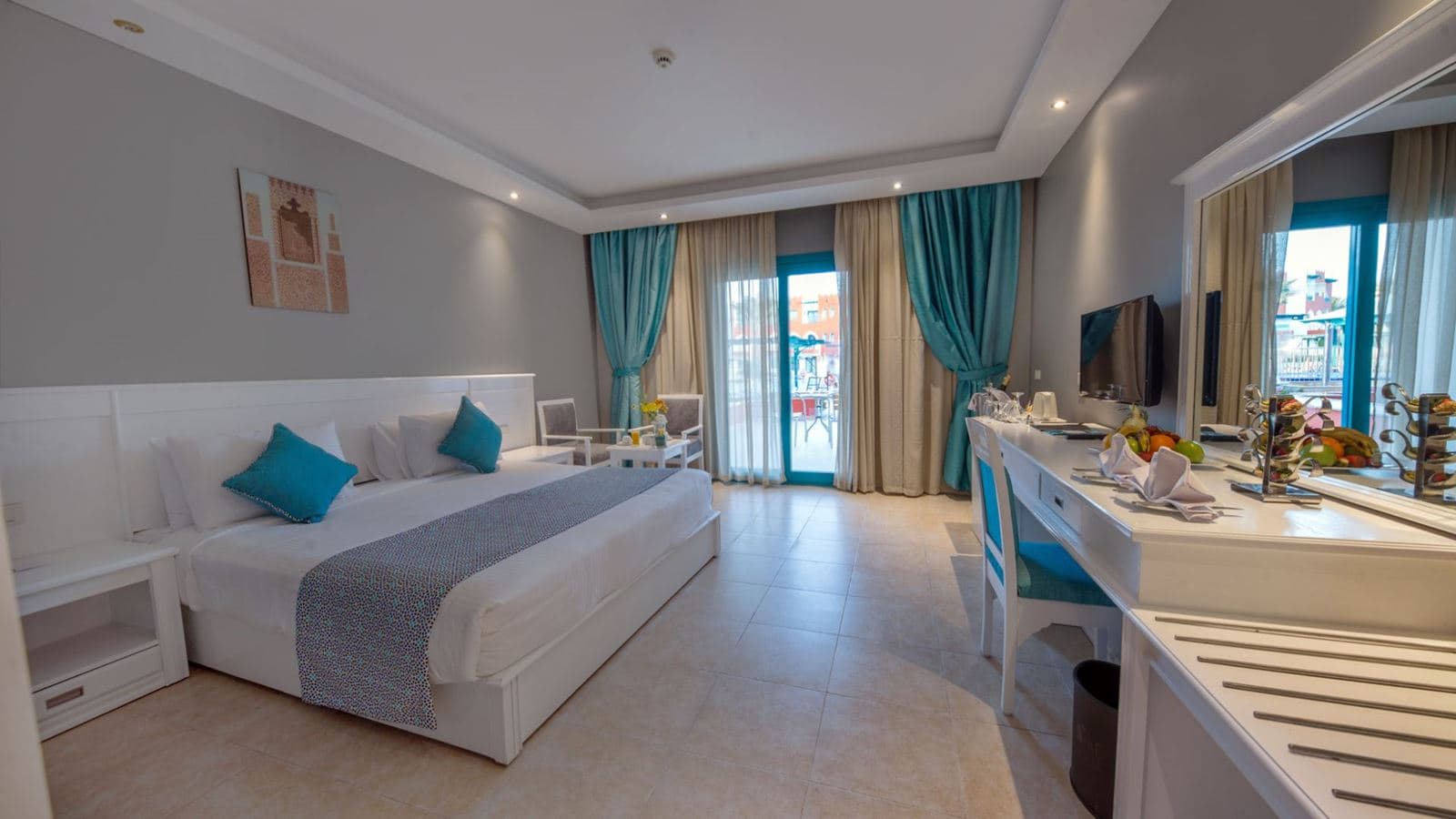 rooms-deluxe-room-garden-pool-sea-view