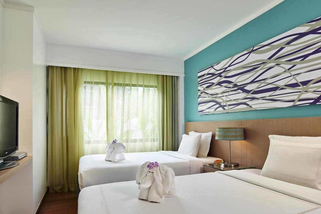 rooms-two-bedroom-suite-with-terrace-pool-view