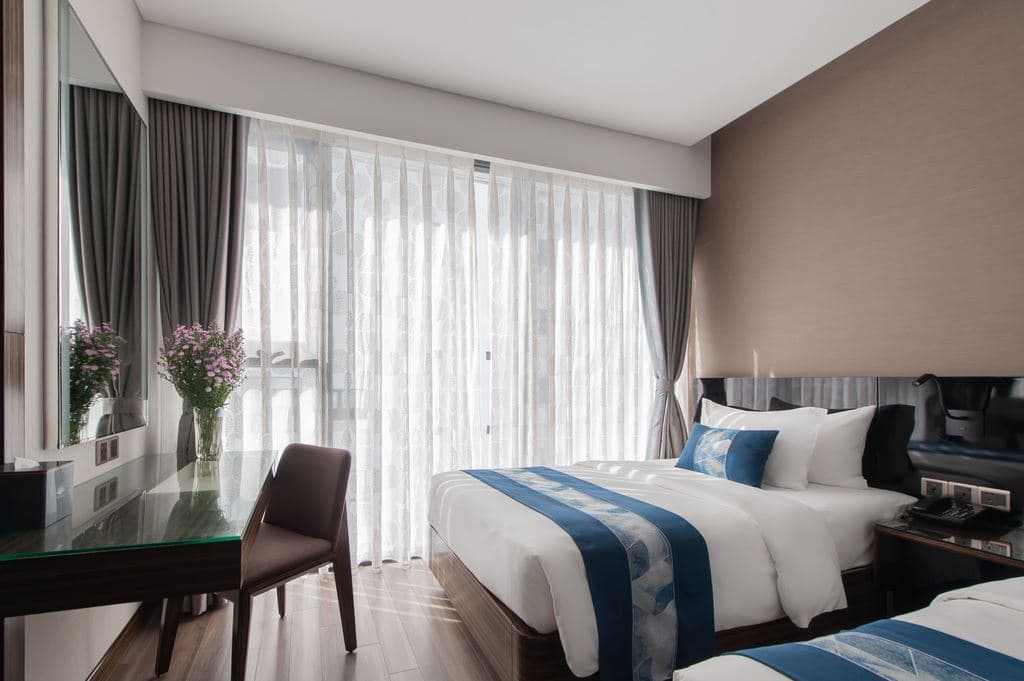 rooms-triple-suite-partial-sea-view-with-balcony