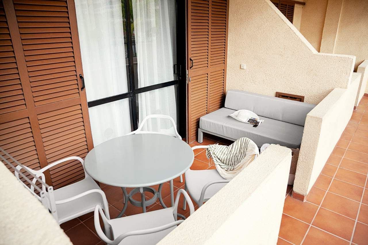 rooms-1-bedroom-apartment-superior-pool-view--balcony-or-terrace