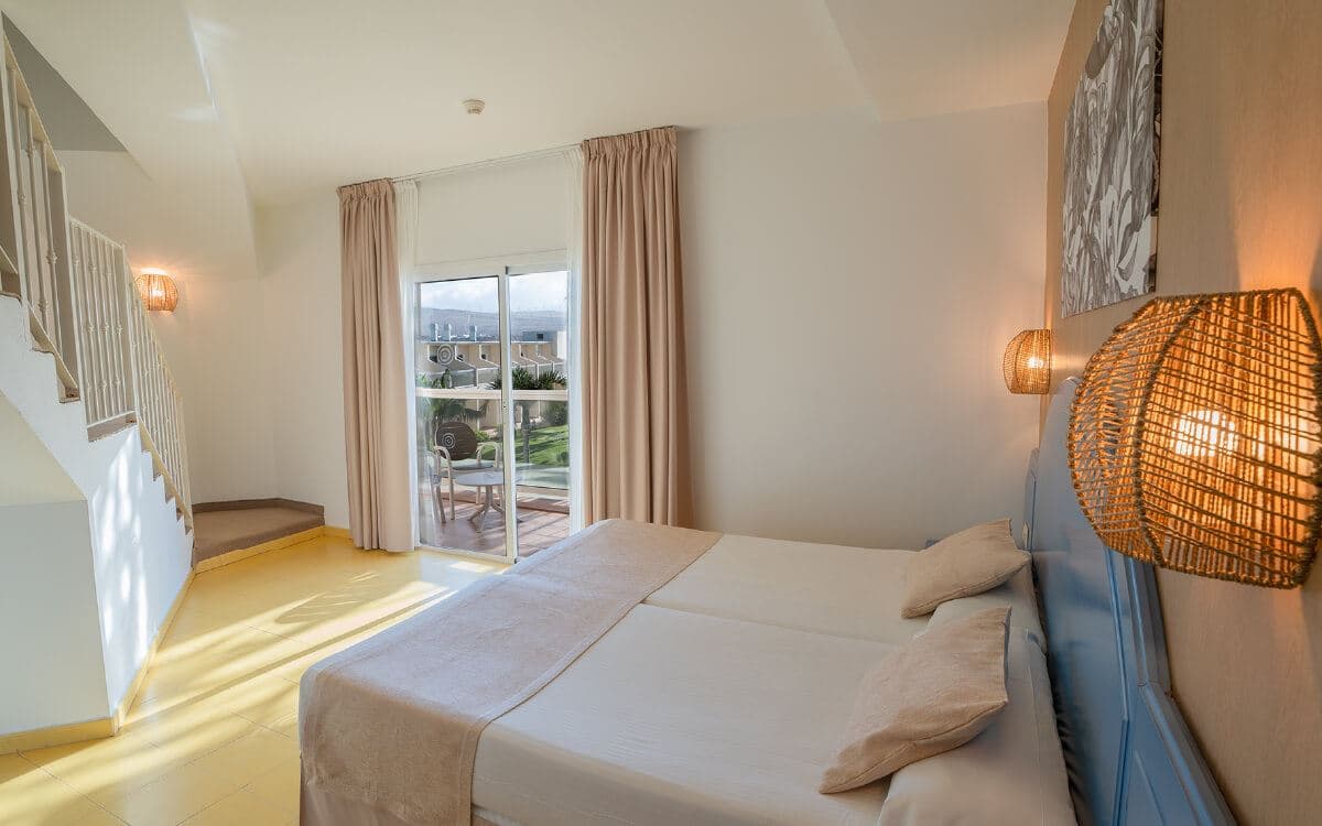 rooms-family-room-pool-view-with-balcony-or-terrace