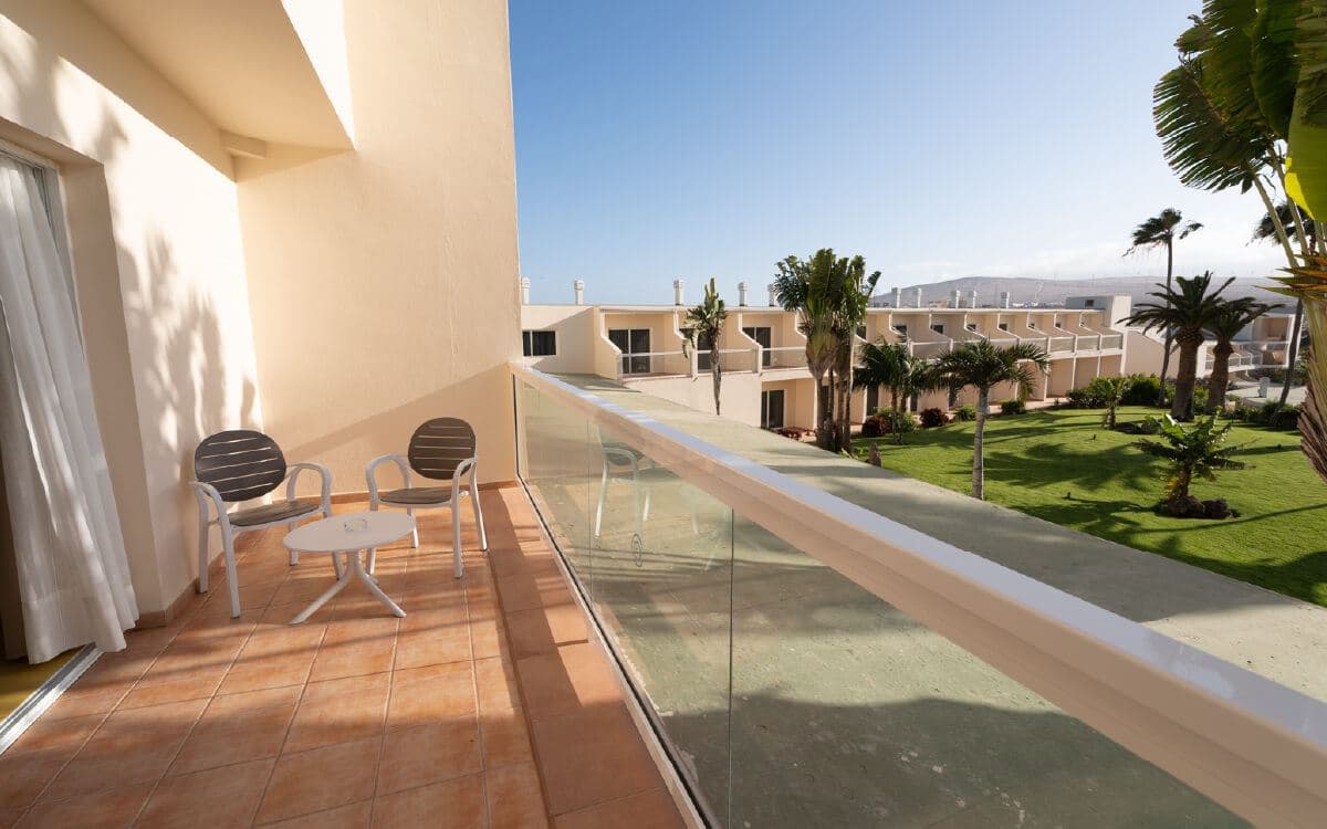 rooms-family-room-pool-view-with-balcony-or-terrace