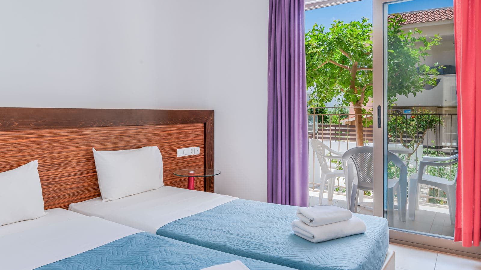 rooms-standard-1-bedroom-triple-apartment-balcony-or-terrace