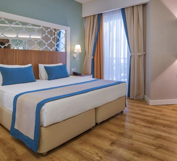 STANDART ROOM WITH SIDE SEAVIEW Camerele