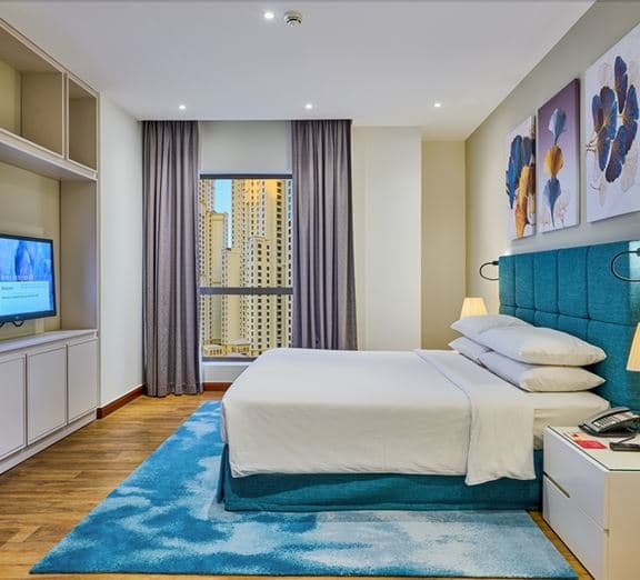 1-BEDROOM KING SUITE WITH BALCONY CITY VIEW Camerele