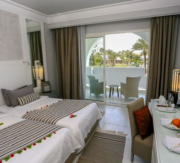DELUXE DOUBLE ROOM GARDEN VIEW Camerele