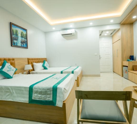 DELUXE TRIPLE WITH BALCONY Camerele