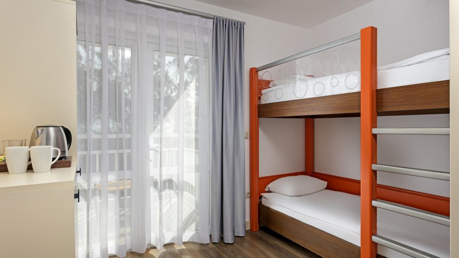 rooms-hotel-standard-bunkbed-room-garden-view-with-balcony-or-terrace