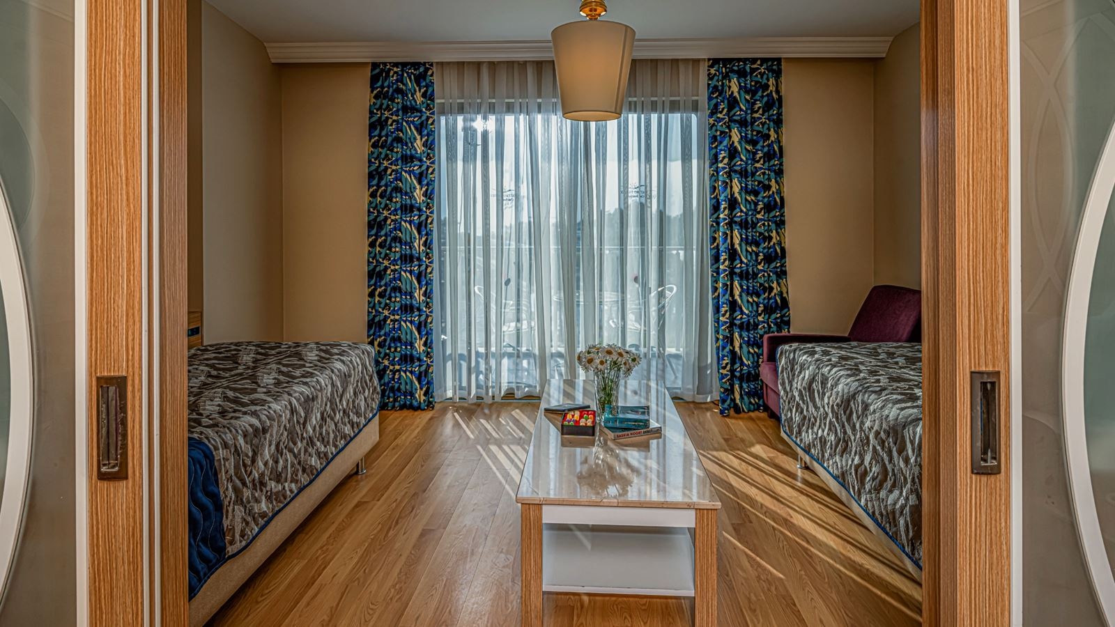 rooms-main-building-family-2-bedrooms-with-sliding-doors-sea-view-couple--ladies-only