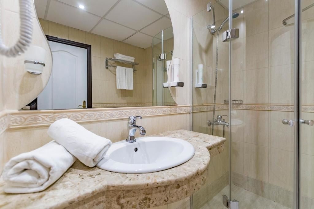 rooms-deluxe-room-lateralseaview-balcony-or-terrace