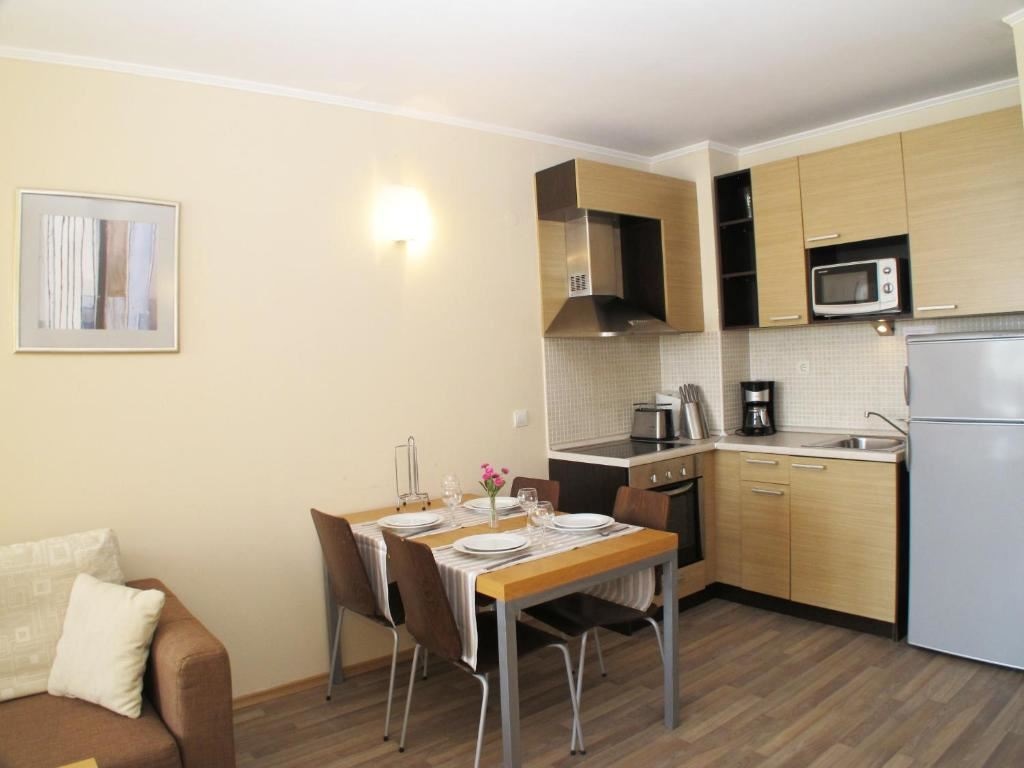 rooms-standard-apartment-poolview-balcony-or-terrace