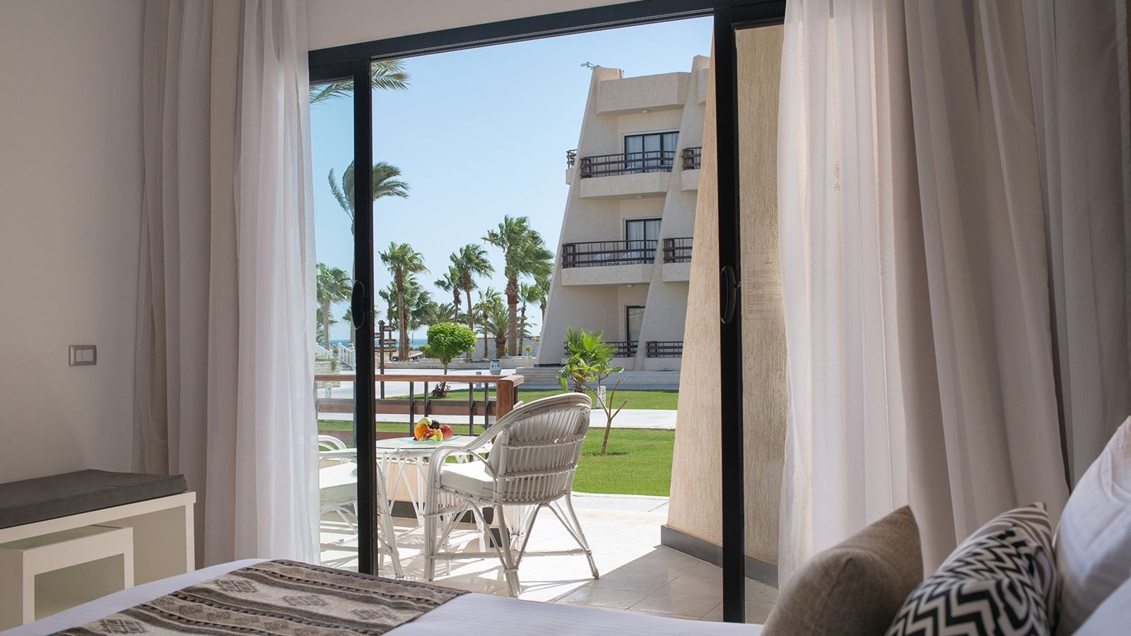 rooms-triple-trouble-room-garden-or-pool-view