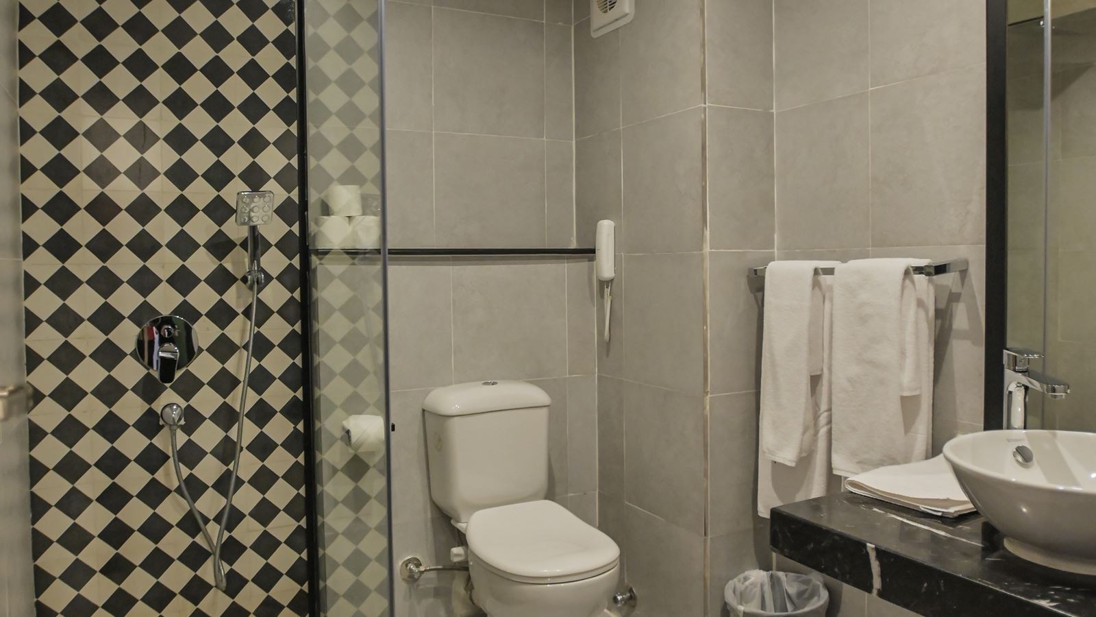 rooms-standard-room-back-view-bedroom-with-queen-size-bed-bathroom-with-shower-window