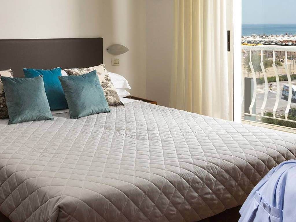 rooms-deluxe-room-pool-view-with-balcony