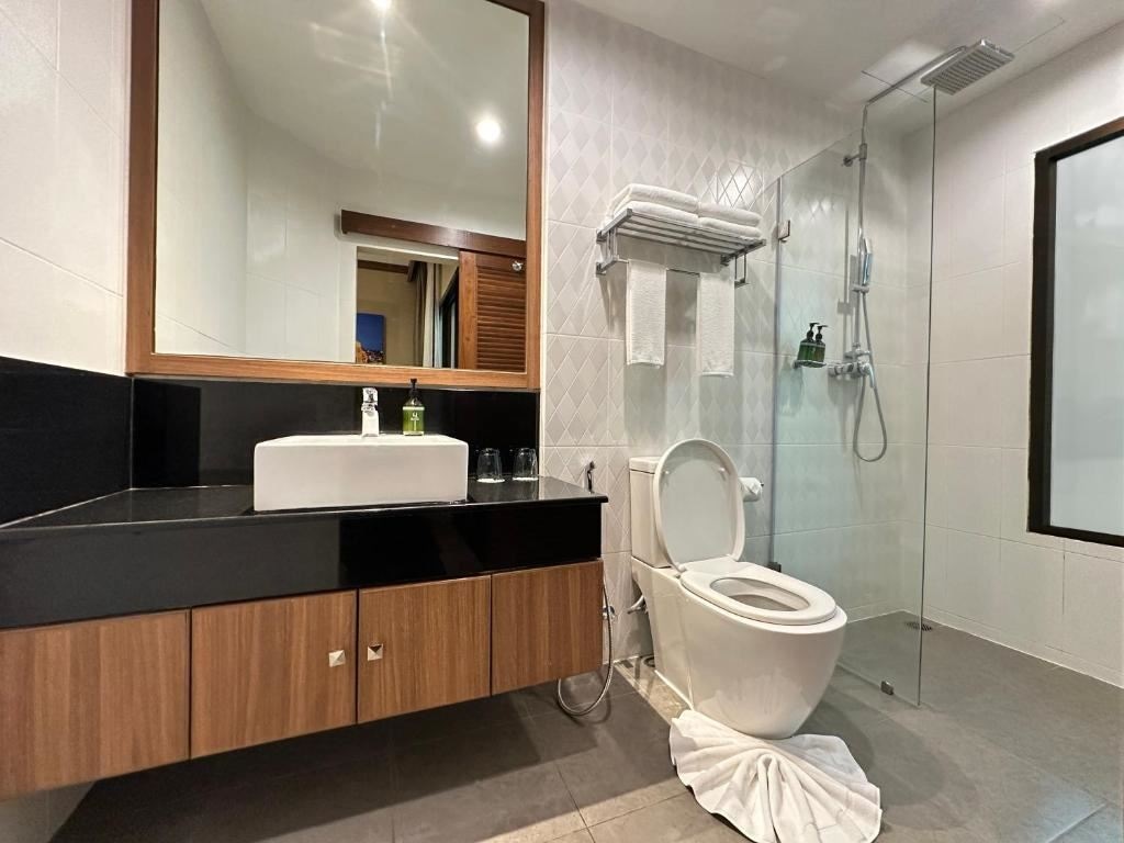 rooms-deluxe-balcony-king-garden-view