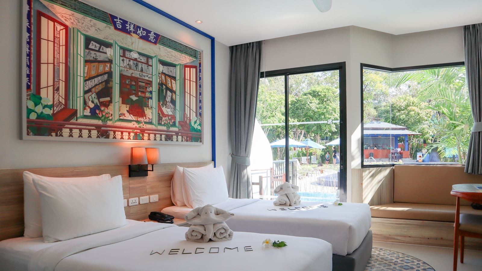 rooms-deluxe-pool-access-child-sharing-bed