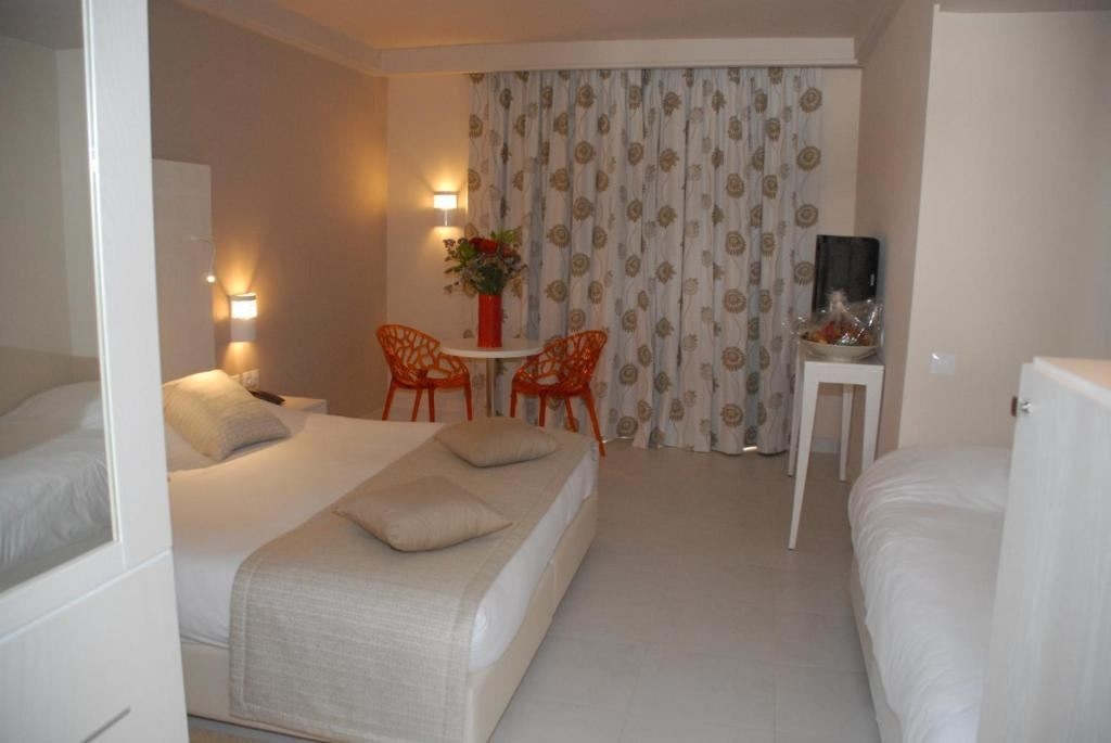 rooms-triple-standard-garden-view-room