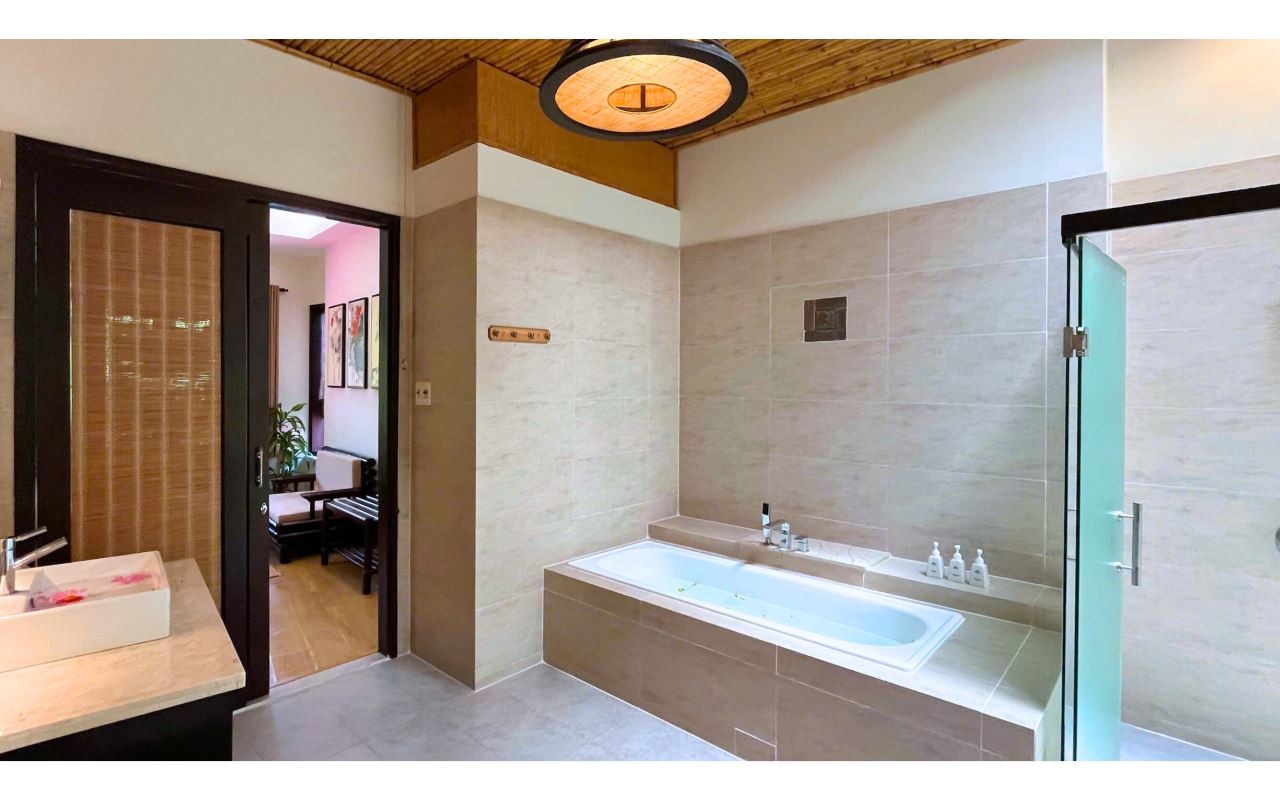 rooms-indochine-suite-garden-view-with-balcony-child-without-extra-bed