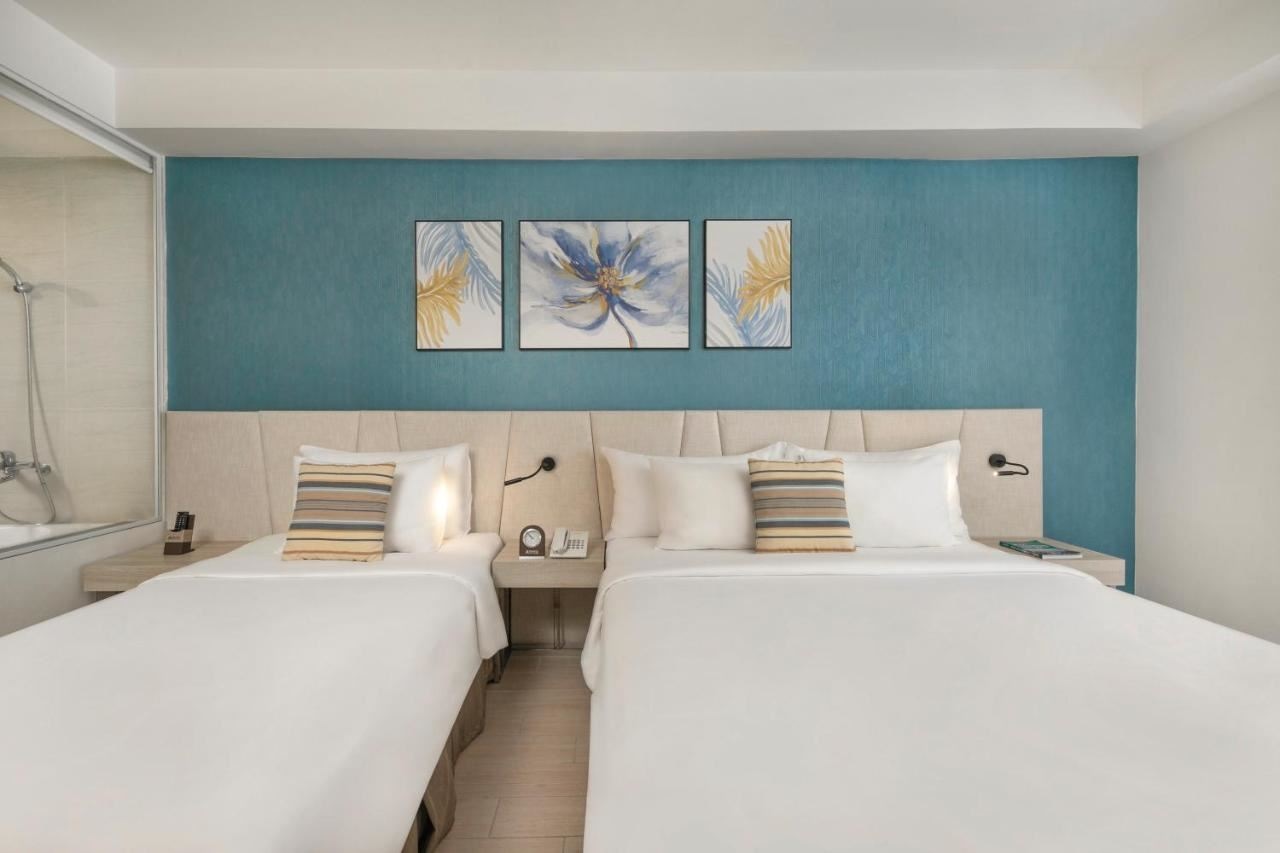 rooms-deluxe-city-view-with-balcony