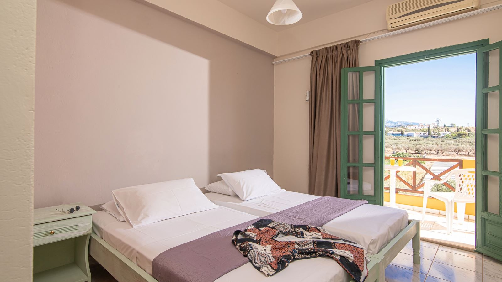 rooms-triple-one-bedroom-apartment-with-garden-or-pool-view