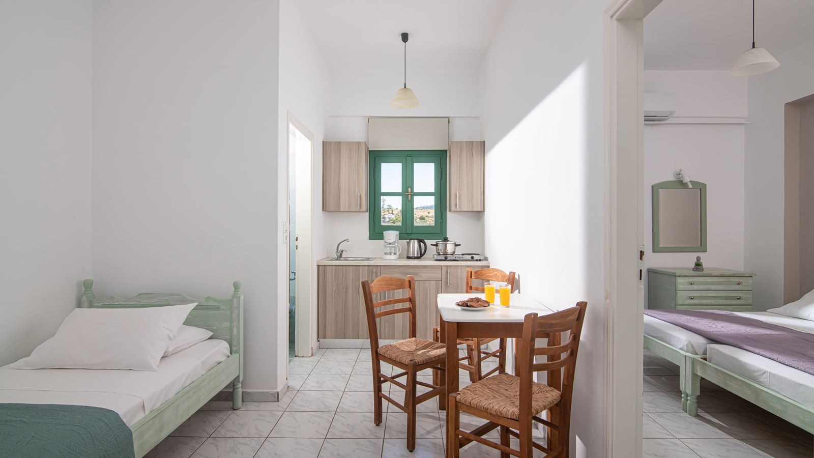 rooms-triple-one-bedroom-apartment-with-garden-or-pool-view