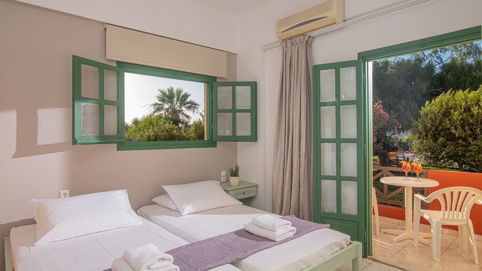 rooms-triple-one-bedroom-apartment-with-garden-or-pool-view