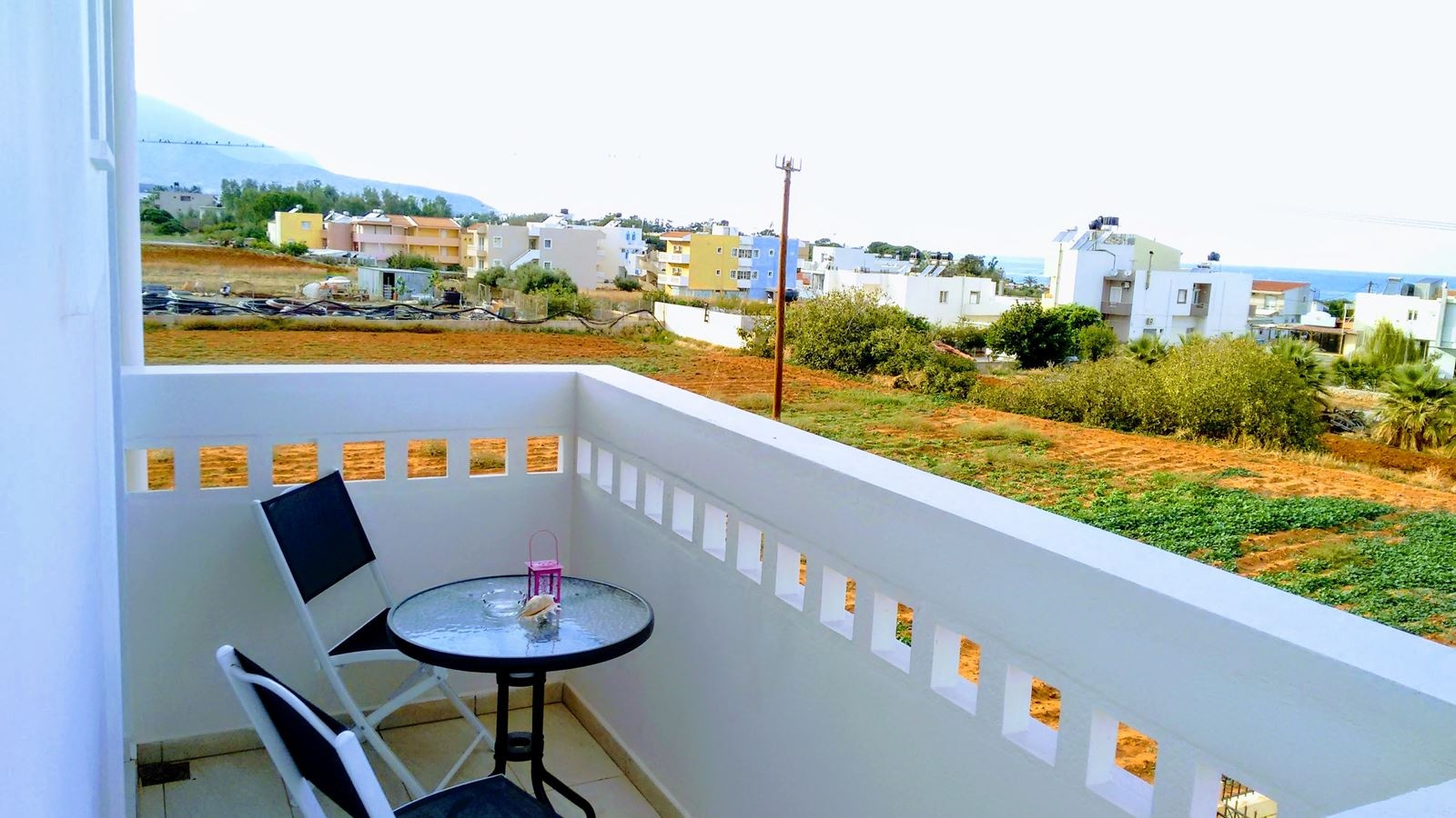 rooms-superior-1-bedroom-apartment-side-sea-view-or-pool-view-balcony-or-terrace