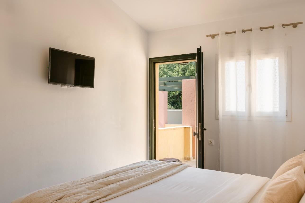 rooms-double-or-twin-room-garden-view-balcony-or-terrace