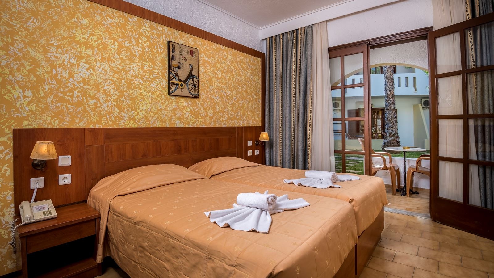 rooms-bungalow-standard-double-garden-view-balcony-or-terrace-with-private-sunbeds