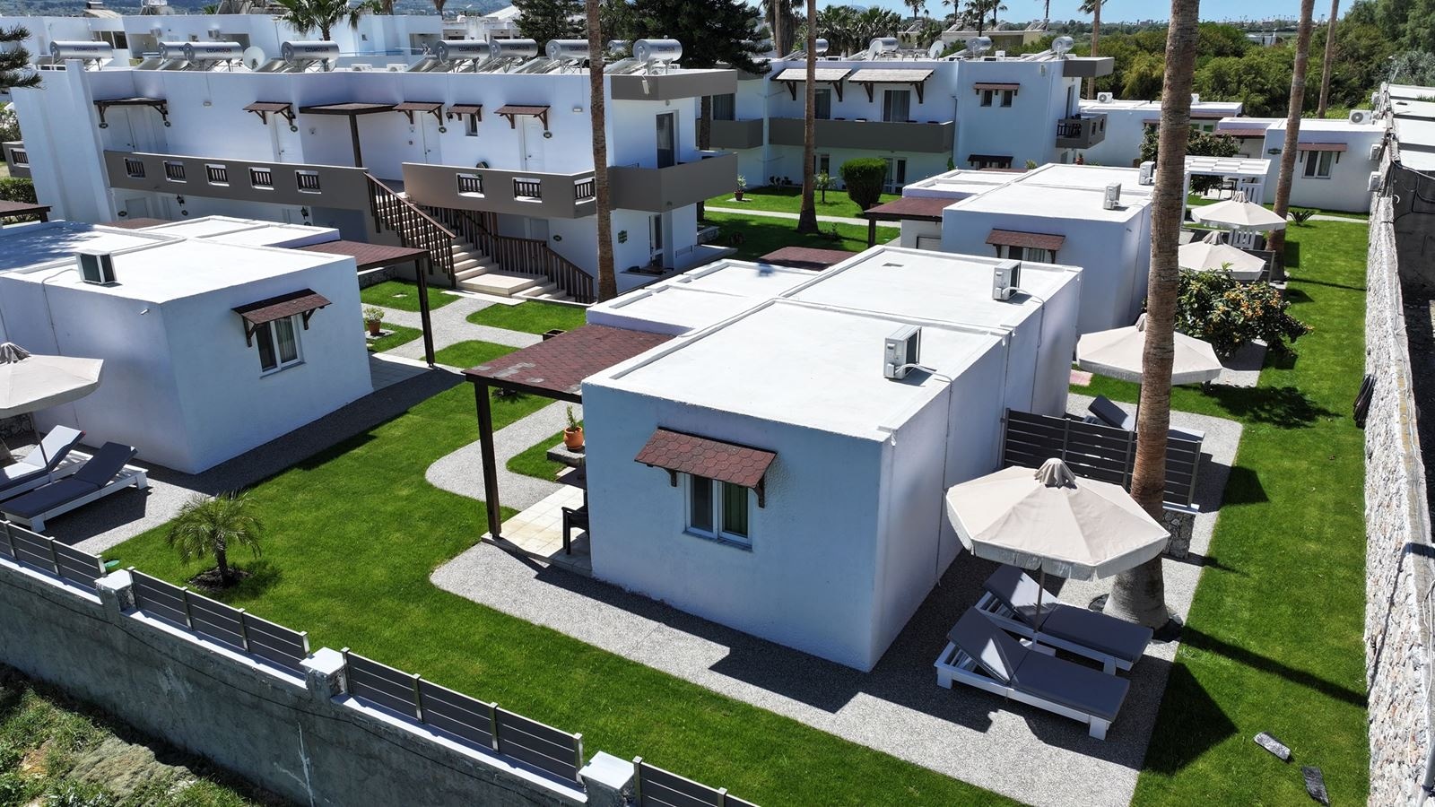 rooms-bungalow-standard-double-garden-view-balcony-or-terrace-with-private-sunbeds